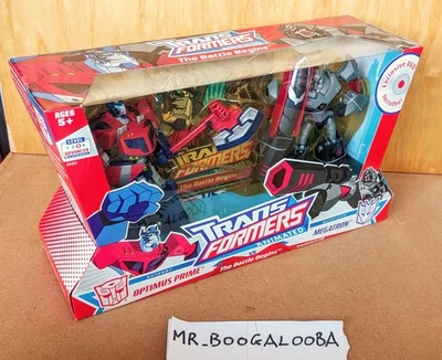 Transformers 2009 Animated The Battle Begins Optimus Prime vs Megatron MISB - Immagine 1 di 4