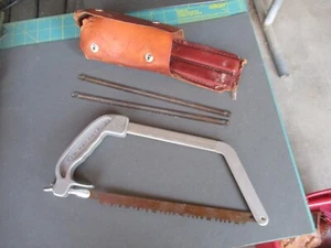 Vintage WYOMING SAW, seghetto da sopravvivenza pieghevole con supporto in pelle masticata - Foto 1 di 14