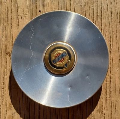 Chrysler Town And Country center cap 2001-2003 part # 04743123AA 01 - Image 1 of 3