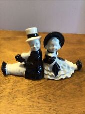 Vintage Porcelain  Girl and Boy bookends marked Japan black and white 4 X 4” Ea.