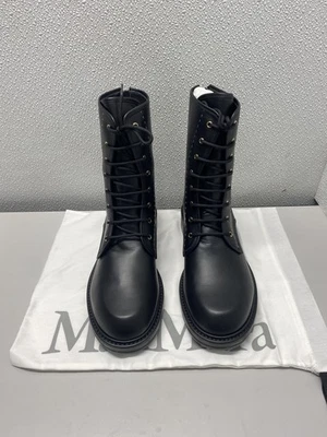 Botas de combate femininas Max Mara EUA 10 couro urbano 24247960316 pretas - Imagem 1 de 4