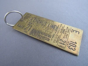 VINTAGE LOWELL SIGMOND 1981 BRASS A CHORUS LINE CONCERT TICKET KEYCHAIN - Picture 1 of 5