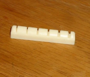 1.75" GUITAR NUT PLASTIC NECK PART PARTS FIX IT REPAIR REPLACE ACOUSTIC ELECTRIC - Picture 1 of 11