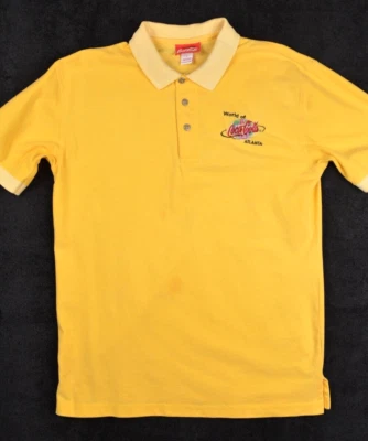 Camisa polo vintage de Coca Cola para hombre mediana amarilla World of Atlanta Foto 1 de 4