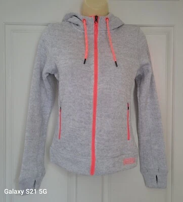 Новый Superdry Storm наследия молнии капюшон куртка W-большой палец держать рукав женщин США 2 новый с Ярлыками - Изображение 1 из 4