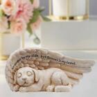 Sleeping dog in angel wing, sculpture, pet monument, tomb marking,