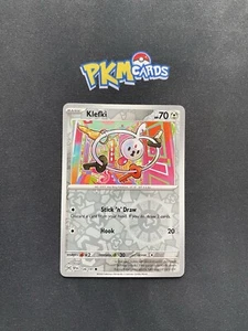 Pokemon Klefki Surging Sparks 128/191 Holograma Inverso LP. - Imagen 1 de 3