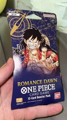 1x One Piece Romance Dawn English OP-01 Paquete Blister Sellado con Mangas - NUEVO/SELLADO Foto 1 de 2