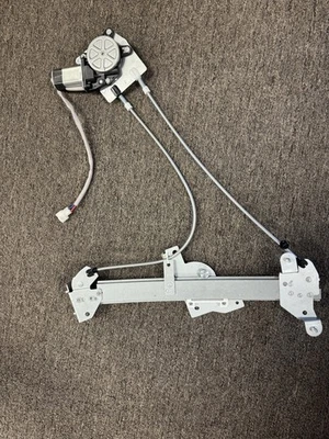 99-05 MAZDA MIATA MX-5 OEM LADO DEL CONDUCTOR IZQUIERDO REGULADOR VENTANA IZQUIERDA CON MOTOR Foto 1 de 3