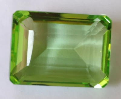 Large Green Peridot 72.15 Ct. Emerald Cut Loose Gemstone Ring & Pendant Bracelet - Image 1 of 4