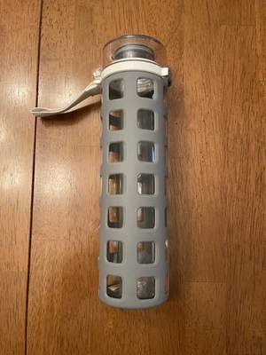 Botella de agua de vidrio sindicado libre de BPA Ello con funda de silicona gris tapa a prueba de fugas Foto 1 de 4