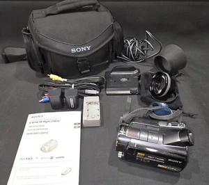Sony HDR-SR11 Handycam, Charger, Carry Case, Cables, & Sony VCL-HG1737C Lens - Picture 1 of 2
