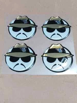 SET OF 4 NOS AUTHENTIC 2001 25th ANNIVERSARY DAYTON WIRE WHEEL LOWRIDER EMBLEMS - Image 1 of 4