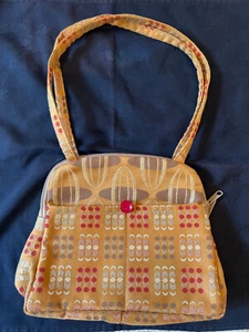 NEU OHNE ETIKETT BOUTIQUE HANDGEFERTIGT GOLD/ROT STOFF BEUTELTASCHE/SCHULTERHANDTASCHE. MEDIUM GR. REISSVERSCHLUSS TOP. - Bild 1 von 5