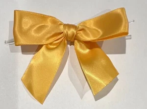 100, 3 1/2 INCH YELLOW/GOLD BOWS, WITH TWIST WIRE TIES FOR GIFT BAGS - Picture 1 of 3