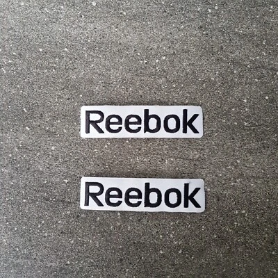 Camiseta deportiva con parche de hockey sobre hielo Reebok etiqueta blanca 10 piezas hierro en la espalda Foto 1 de 3