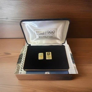 Olympic Two Bausch Lomb Pins 94-96 Worldwide Sponsor Lillehammer Suede Case Vtg. - Picture 1 of 4