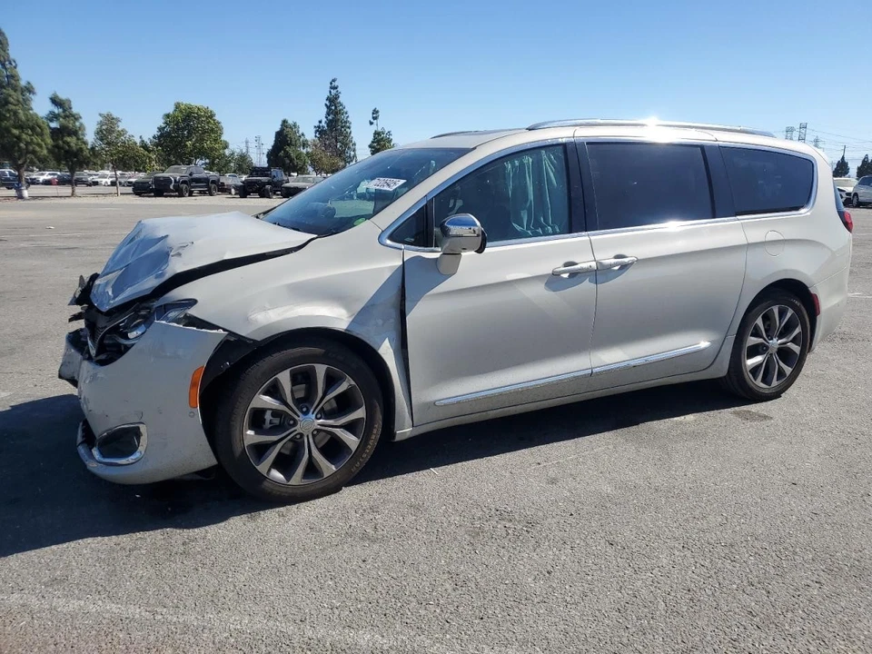 Used Left Windshield fits: 2017 Chrysler Pacifica L. chrome moulding Left Grade - Image 1 of 4