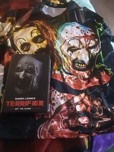 NECA Terrifier Art The Clown Figur Clean Version & Free Terrifier Shirt - Bild 1 von 3