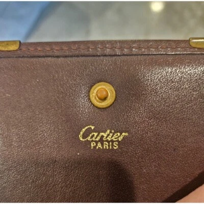 Cartera de cuero Cartier Paris con cierre a presión marrón Foto 1 de 4
