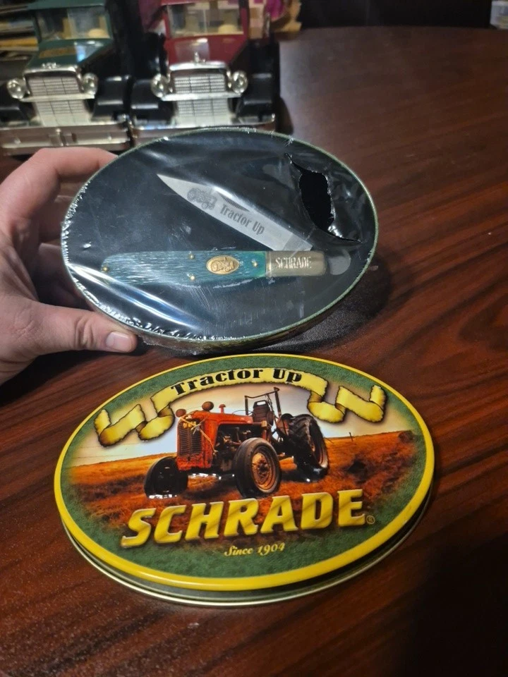 Cuchillo plegable Schrade Tractor Up de una sola hoja con estaño Foto 1 de 1