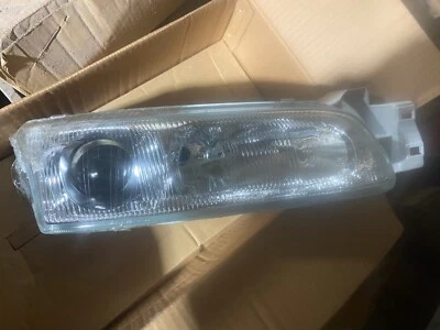 Lámpara de O/S para cabezal del conductor Mazda 626 1992 - 1997 Foto 1 de 3