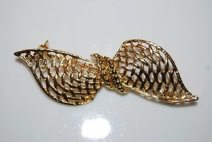 ELEGANT VINTAGE BOLD RUNWAY COUTURE GOLD TONED METAL BOW PIN OR BROOCH - Imagen 1 de 4