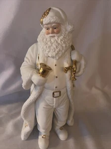 Porzellan Weihnachtsmann weiß, gold mit einem Beutel mit Leckereien und einer goldenen Glocke - Bild 1 von 11