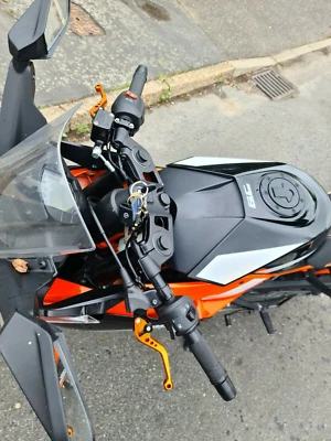 Palancas cortas de embrague y freno CNC naranja para KTM RC 390 2013-2021 Foto 1 de 4