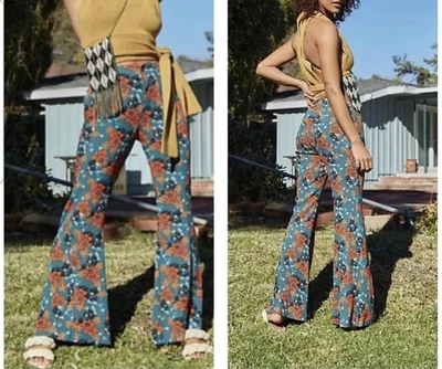 Pantalones FREE PEOPLE S No puedo quitarme los ojos de ti acampanados florales cintura alta naranja Foto 1 de 4