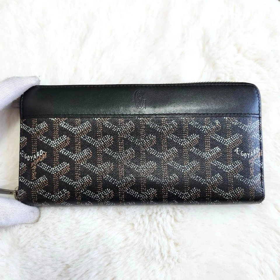 Portefeuille long rond zippé Goyard Matignon logo couleur noir marron article... - Photo 1/4