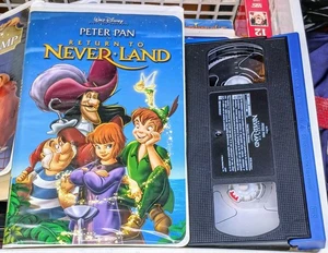 Peter Pan Return to Never Land (VHS, 2002,Walt Disney) 23964 - Foto 1 di 4