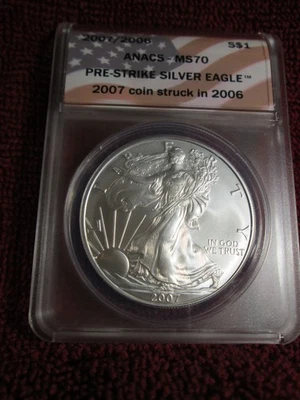 2007 $1 AMERICAN SILVER EAGLE ANACS MS70 PRE STRIKE STRUCK IN 2006 FLAG LABEL - Image 1 of 2
