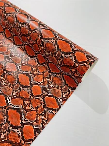 VIPER - Snake Skin Vinyl-Faux Leather-3D Scales Fabric by Yard. ORANGE/BLACK - Picture 1 of 3