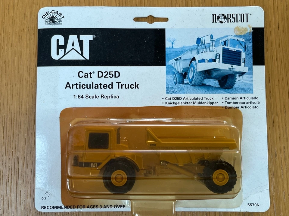 Norscot CAT D25D 1:64 scale Articulated Truck in sealed packaging - Image 1 of 1