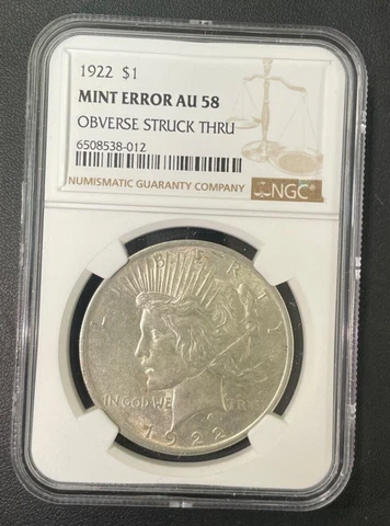 1922 P Peace Dollar 1$ NGC Mint Error AU-58 Obverse Struck Thru, Very Prominent Cover