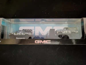 2025 M2 MACHINES GMC Haulers Camo '73 JIMMY SIERRA 4X4 & '98 SIERRA 1500 4X4 R86 - Picture 1 of 4