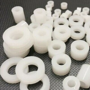 NYLON SPACER STAND OFF BUSH VARIOUS DIAMETERS LENGTHS & BOLT CLEARANCE HOLES - Picture 1 of 7