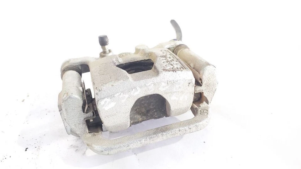 Nissan Altima 2019 2020 pinza de freno trasera izquierda OEM sin estacionamiento eléctrico  Foto 1 de 4