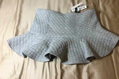 Falda acampanada acolchada de polietileno elástica Aqua mini falda gris jaspeado talla S 193 Foto 1 de 4