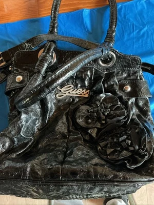 Black Guess Purse Floral Design Leopard Inside Pattern 7/10 Condition - Image 1 of 4