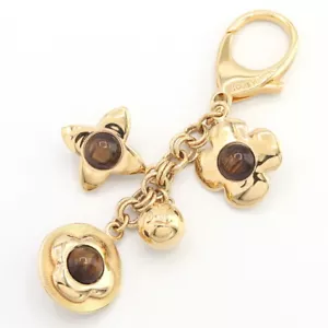 LOUIS VUITTON Bag Charm Bijoux Sack Tresor M66349 Gold Brown Metal Used - Picture 1 of 6