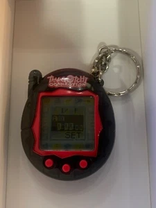 Tamagotchi Connection V3 translúcido negro rojo 2006 probado funciona - Imagen 1 de 5