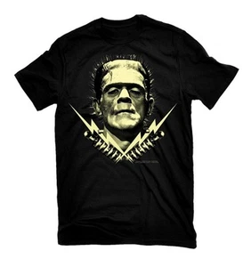CAMISETA UNIVERSAL MONSTERS FRANKENSTEIN BOLTS BRILLA EN LA OSCURIDAD BORIS KARLOFF S-2XL - Imagen 1 de 3