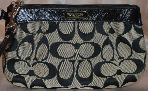 Bracciale Coach Signature nero e grigio con cerniera e finiture in pelle nera