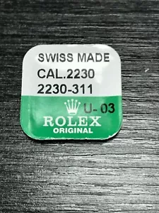 Auténtico resorte principal sellado de fábrica Rolex Cal. Pieza 2230. 311 - NOS - Imagen 1 de 3