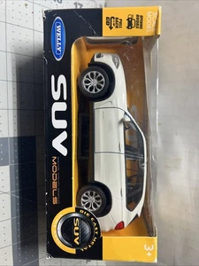 Welly BMW X5 weiß Maßstab 1:32 Pull Back And Go neu im Karton - Bild 1 von 5