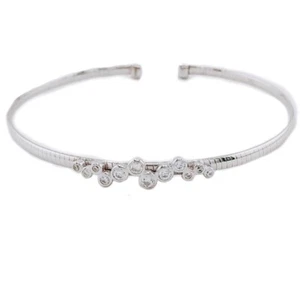 Bracciale rigido argento925 rodiato bangle grappolo centrale pietre bianche - Foto 1 di 3