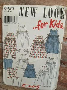 New Look Sewing Pattern 6493 Girls Dress Top Jumper Romper Jumpsuit Sizes 4-9 UC - Picture 1 of 2