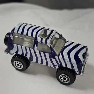 Matchbox Ford Bronco ll 1987 White Purple Blue Zebra Rare 1:57 VTG Diecast Car - Picture 1 of 10